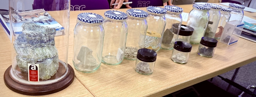 Image of asbestos samples in glass jars